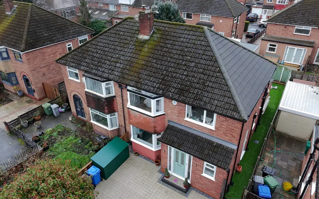 Roof covered in moss across the full pitch before cleaning