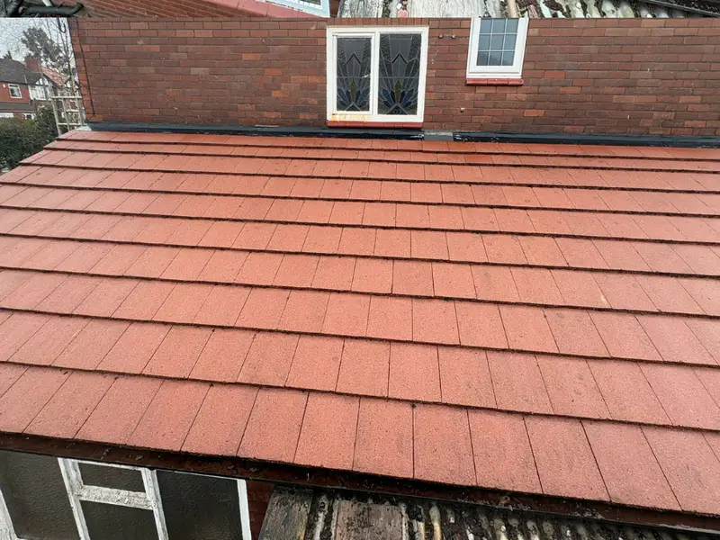 A concrete tile roof after cleaning